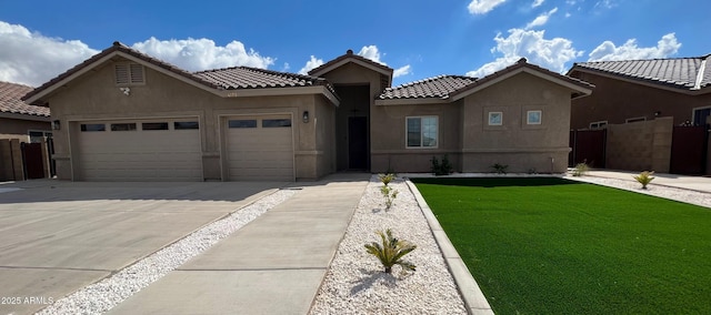 4173 W 27th Ln, Yuma, AZ 85364 - ranch-style house featuring stucco siding, an attached garage, driveway, and a tile roof