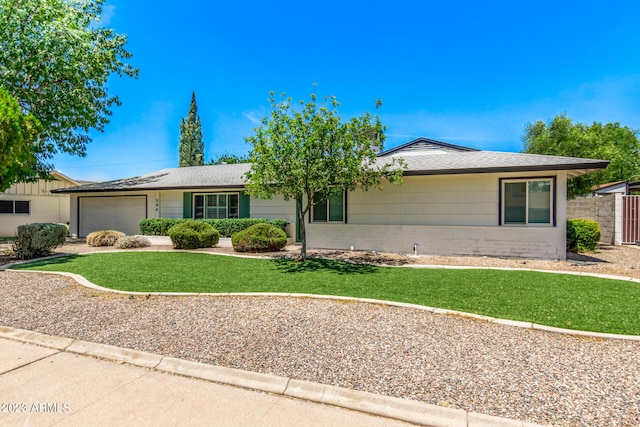 single story home with an attached garage, concrete driveway, and roof with shingles