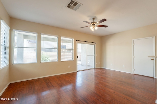 4010 W Fremont Rd, Phoenix, AZ 85041 - unfurnished room featuring a ceiling fan, wood finished floors, and baseboards