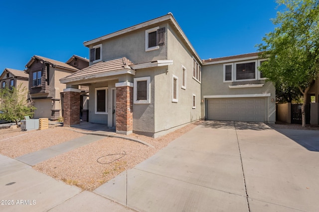 4010 W Fremont Rd, Phoenix, AZ 85041 - traditional-style house with a garage, stucco siding, and concrete driveway