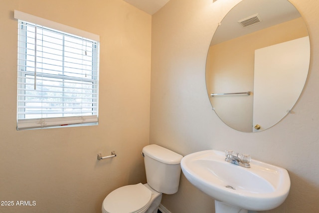 4010 W Fremont Rd, Phoenix, AZ 85041 - half bath featuring a sink and toilet