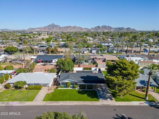 aerial view with a mountain view and a residential view