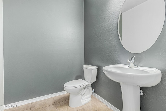 7090 S 252nd Dr, Buckeye, AZ 85326 - half bath featuring toilet, tile patterned flooring, and baseboards