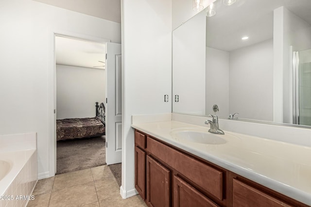7090 S 252nd Dr, Buckeye, AZ 85326 - bathroom with ensuite bath, vanity, a bath, tile patterned flooring, and a shower with shower door