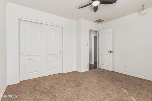7090 S 252nd Dr, Buckeye, AZ 85326 - unfurnished bedroom with carpet flooring, a closet, and baseboards
