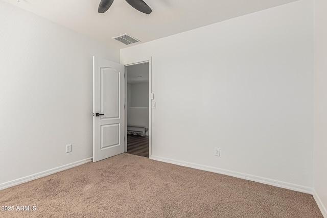 7090 S 252nd Dr, Buckeye, AZ 85326 - carpeted empty room with baseboards and ceiling fan