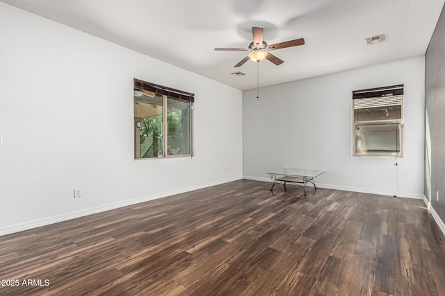 7090 S 252nd Dr, Buckeye, AZ 85326 - unfurnished room featuring ceiling fan, wood finished floors, and baseboards