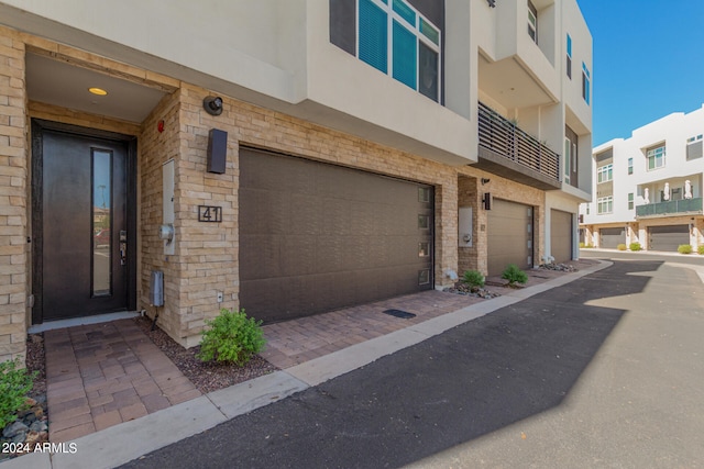 exterior space with a garage