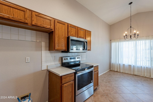 kitchen with backsplash, stainless steel appliances, a notable chandelier, hanging light fixtures, and lofted ceiling