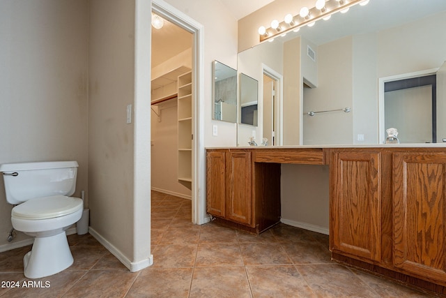 bathroom featuring tile patterned floors and toilet