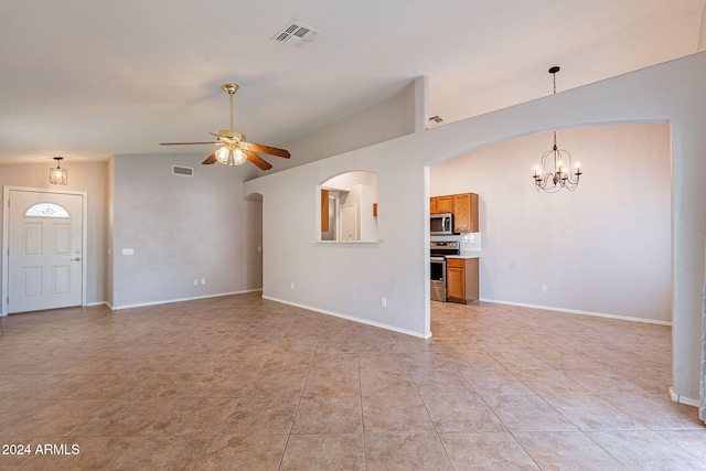 unfurnished living room featuring light tile patterned floors and ceiling fan with notable chandelier