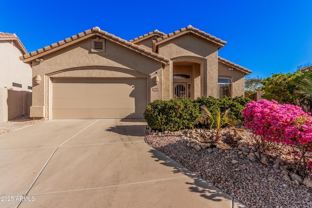 view of front of home with a garage