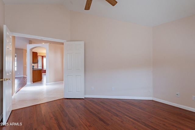 unfurnished room featuring ceiling fan and light hardwood / wood-style flooring