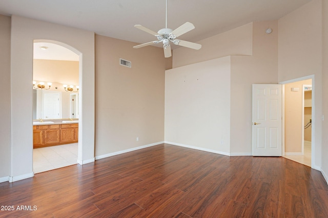 unfurnished room with ceiling fan and light wood-type flooring