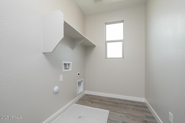 1571 E Tiffany Way, Gilbert, AZ 85298 - laundry area with hookup for a washing machine, electric dryer hookup, wood finished floors, and baseboards