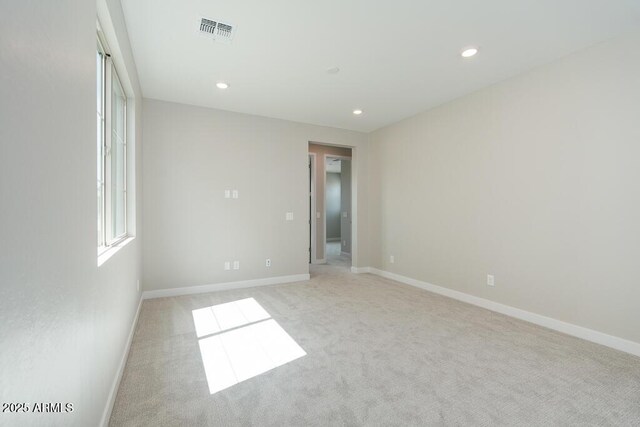 1571 E Tiffany Way, Gilbert, AZ 85298 - empty room featuring light carpet, recessed lighting, and baseboards