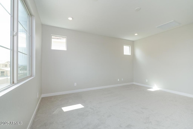 1571 E Tiffany Way, Gilbert, AZ 85298 - unfurnished room featuring light carpet, plenty of natural light, baseboards, and recessed lighting