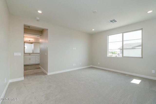 1571 E Tiffany Way, Gilbert, AZ 85298 - spare room featuring light colored carpet, recessed lighting, baseboards, and a smoke detector