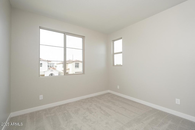 1571 E Tiffany Way, Gilbert, AZ 85298 - spare room featuring carpet flooring and baseboards