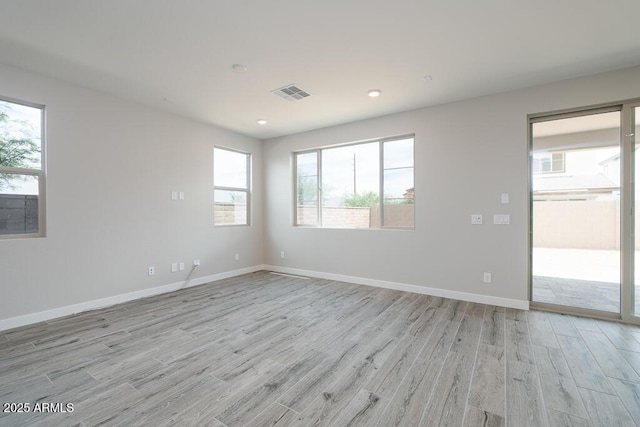 1571 E Tiffany Way, Gilbert, AZ 85298 - empty room featuring light wood-style flooring, baseboards, and recessed lighting