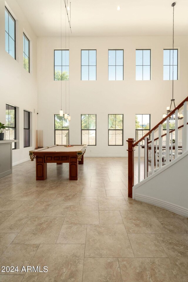 rear view of house with ceiling fan, outdoor lounge area, a patio, a lawn, and sink