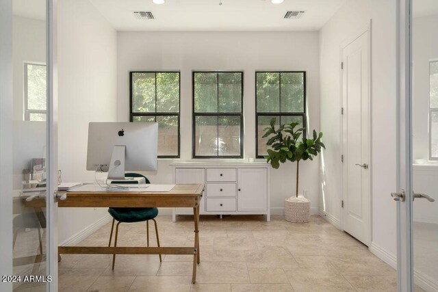 property entrance featuring french doors