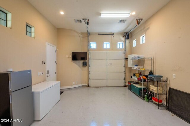 recreation room with billiards, french doors, a high ceiling, and light tile patterned floors