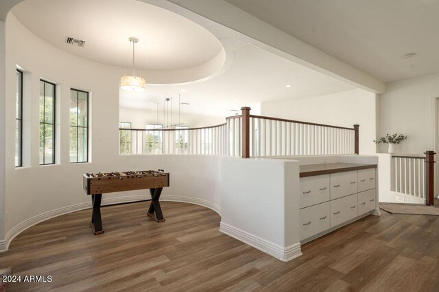 unfurnished room featuring dark wood-type flooring