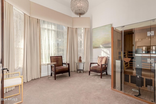 living area with carpet floors and a healthy amount of sunlight