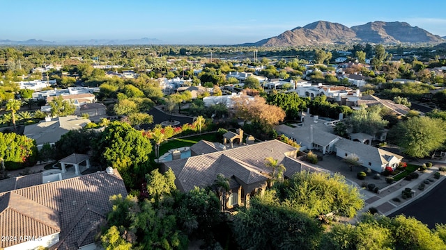 birds eye view of property featuring a mountain view