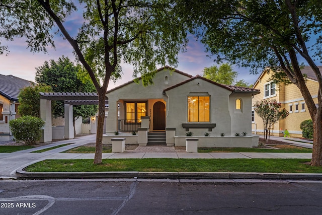 2774 E Valencia St, Gilbert, AZ 85296 - mediterranean / spanish-style home with a tiled roof, stucco siding, and concrete driveway