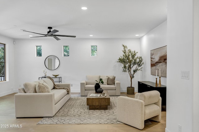 2774 E Valencia St, Gilbert, AZ 85296 - living area with recessed lighting, healthy amount of natural light, a ceiling fan, and wood finished floors