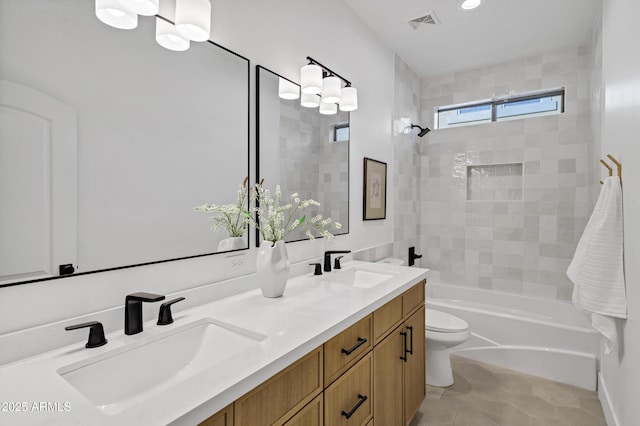 2774 E Valencia St, Gilbert, AZ 85296 - full bathroom featuring toilet, double vanity, and shower / bathtub combination