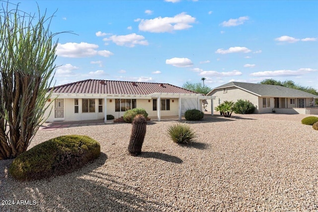 back of house featuring a patio area