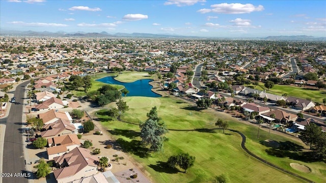 aerial view featuring a water and mountain view