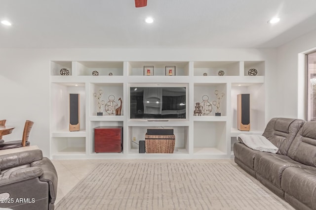 living area featuring recessed lighting, tile patterned floors, and built in shelves