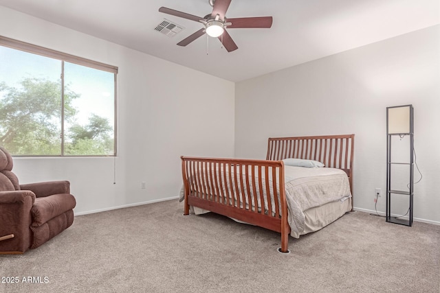 bedroom featuring carpet flooring, baseboards, visible vents, and ceiling fan