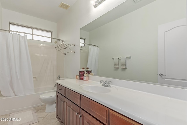 bathroom featuring vanity, visible vents, toilet, tile patterned floors, and shower / tub combo