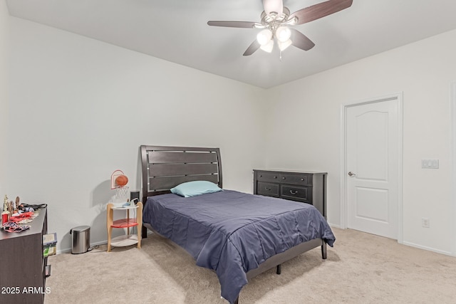 bedroom with carpet floors, baseboards, and ceiling fan