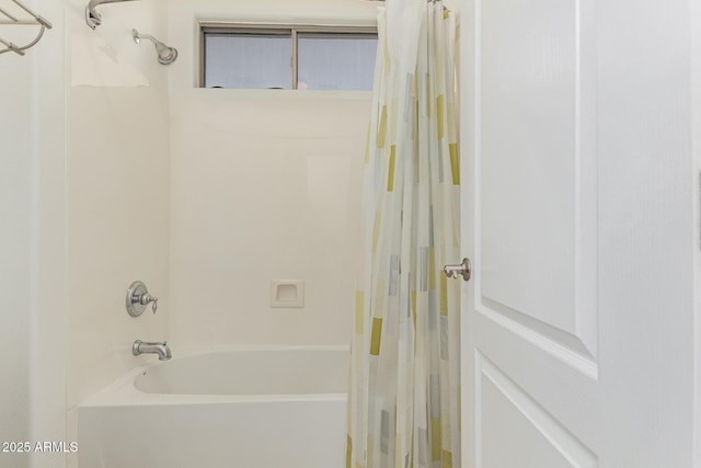 bathroom with shower / bath combo