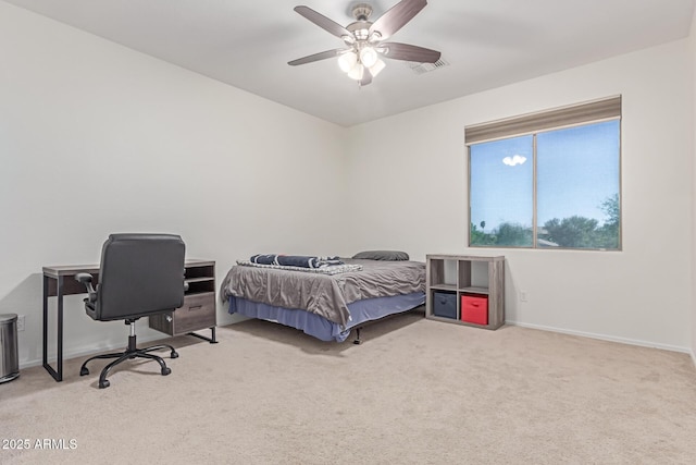bedroom with carpet flooring, baseboards, visible vents, and ceiling fan
