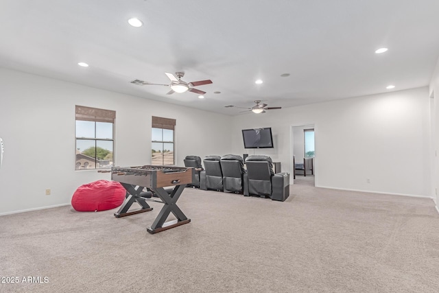 interior space featuring recessed lighting, baseboards, ceiling fan, and visible vents