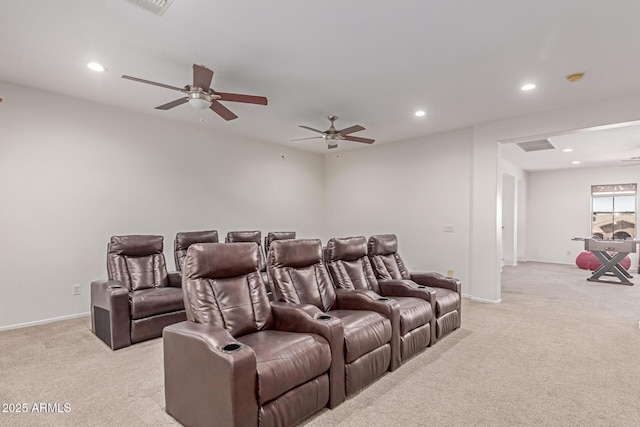 cinema featuring light colored carpet, recessed lighting, and baseboards