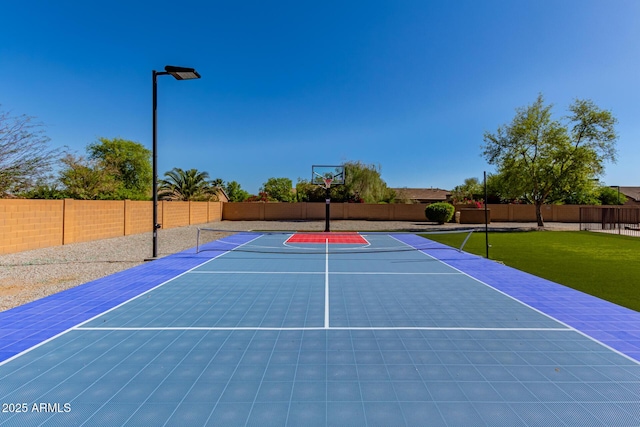 view of sport court with community basketball court and fence