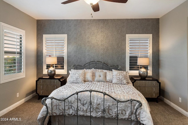 bedroom with ceiling fan and carpet floors