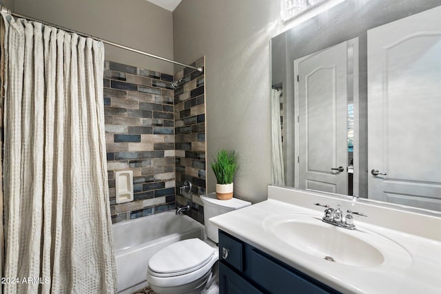 full bathroom featuring vanity, shower / bathtub combination with curtain, and toilet