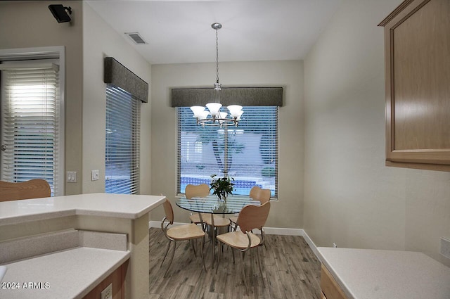 14430 N Agave Dr, Fountain Hills, AZ 85268 - dining space featuring a notable chandelier, plenty of natural light, and light hardwood / wood-style flooring