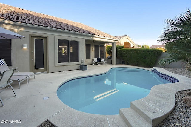 14430 N Agave Dr, Fountain Hills, AZ 85268 - pool at dusk with a patio