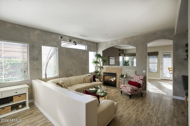 14430 N Agave Dr, Fountain Hills, AZ 85268 - living room with hardwood / wood-style floors and a tiled fireplace