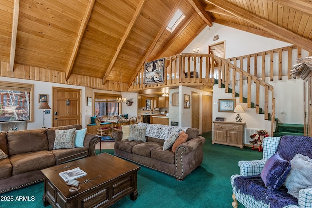 carpeted living area featuring wooden ceiling, beamed ceiling, high vaulted ceiling, and stairs